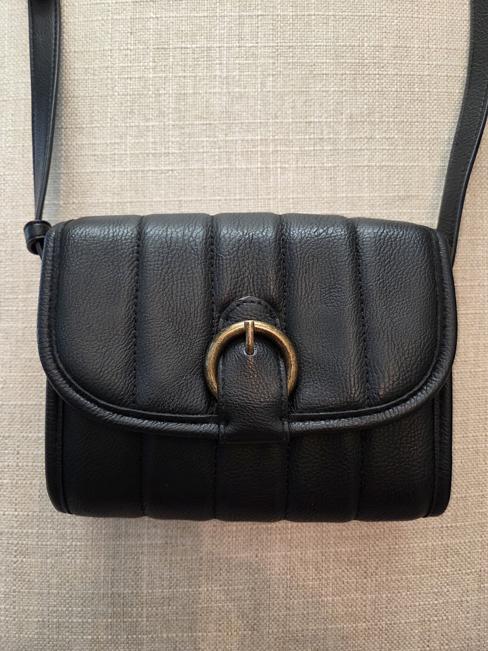 Black Quilted Leather Crossbody Bag with Gold Ring Accent